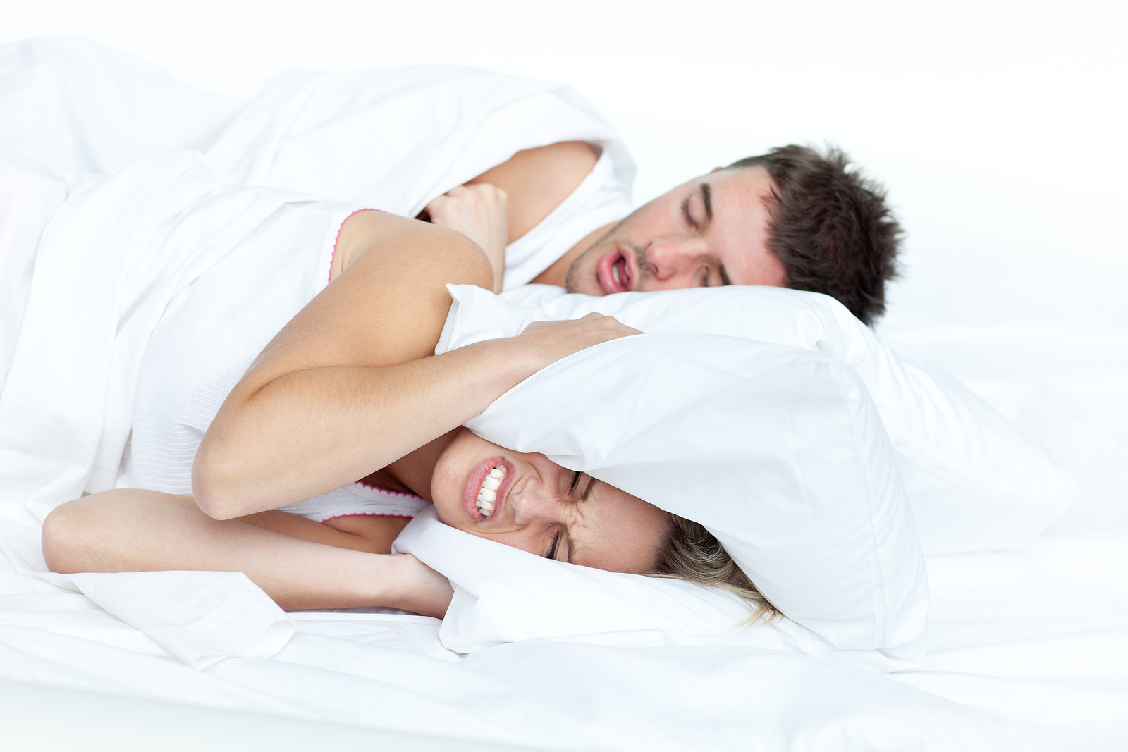 Dentist_Garland_TX_bigstock-Couple-In-Bed-While-The-Woman Dentist_Garland_TX_bigstock-Couple-In-Bed-While-The-Woman
